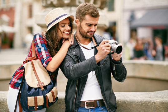 Beautiful Couple Taking Photos On Camera, Traveling
