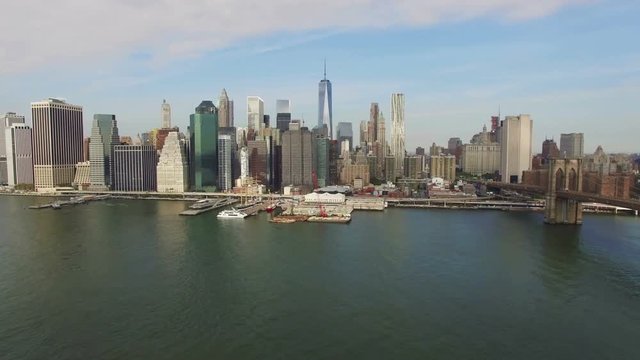 Aerial panoramic view from Brooklyn of Lower Manhattan the Financial District, Brooklyn Bridge and Chinatown, New York, North America, USA. 4K, Ultra HD video