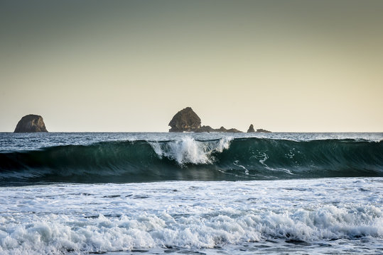 Long wave breaking on the coast of East Java, Java, Indonesia
