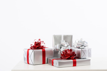 Silver boxes with gifts.