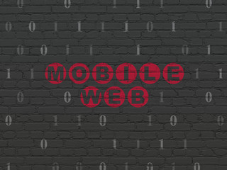 Obraz premium Web design concept: Painted red text Mobile Web on Black Brick wall background with Binary Code