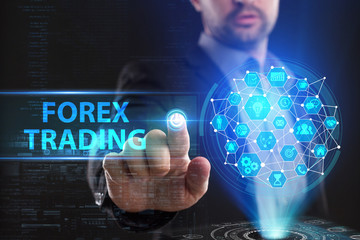 The concept of business, technology, the Internet and the network. A young entrepreneur working on a virtual screen of the future and sees the inscription: Forex trading