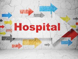 Health concept:  arrow with Hospital on grunge textured concrete wall background, 3D rendering