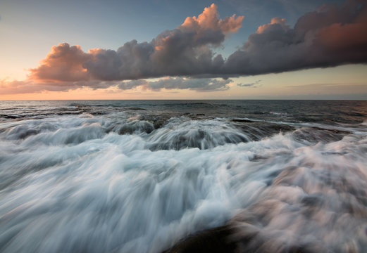 Dramatic waves at sunset in Kudat, Sabah, Borneo, East Malaysia