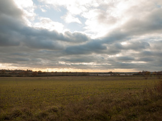 Fototapeta na wymiar dramatic sky over open empty grassland plain special
