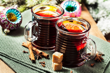 Mulled wine with spices  in glass cups