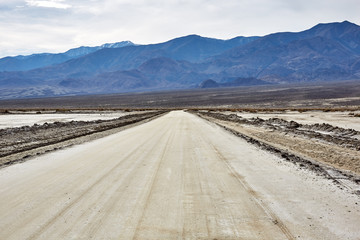 Road towards mountains, Death Valley, USA
