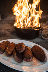 Magrets of duck cooked in the fireplace, French cuisine