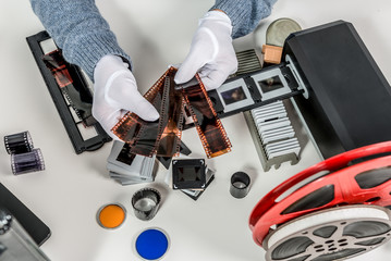 technician scan a negative film and slides