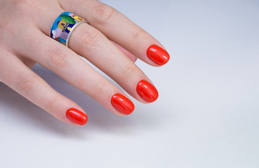 Beautiful natural nails and attractive manicure on women hands.