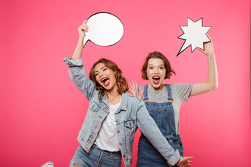 Happy emotional ladies friends holding speech bubbles.