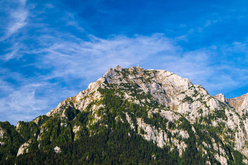 Panorama Bucegi Mountains and Heroes’ Cross on Caraiman from Busteni, Bucegi National Park, Southern Carpathians Mountains, Transylvania, Romania