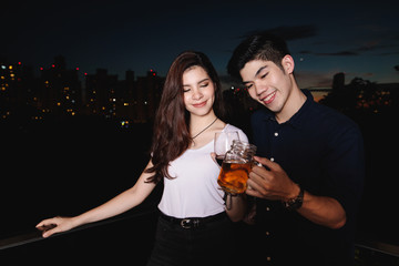 Young asian couple party