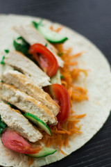 Cooking process - grilled chicken wrap with vegetables and cream cheese