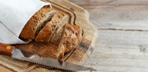 Wholemeal Bread on a Wooden Table