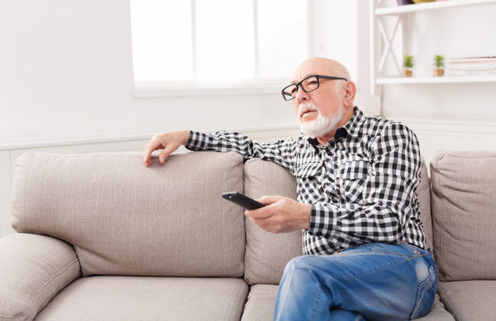 Calm Senior Man Watching Tv Copy Space