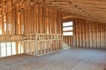Wood frame residential building under construction.