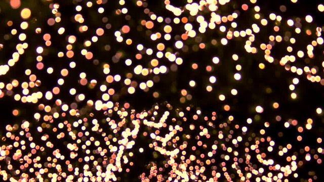 Bright lights moving. Suspended blured lights.