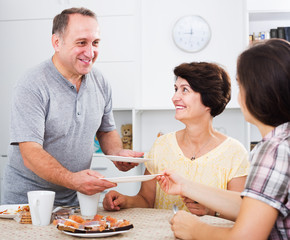 Man setting table for lunch