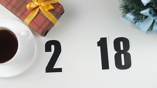 Illustration, new year, male hand removes a soccer ball from the table, 2018