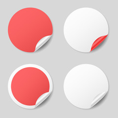 Blank round stickers with curled corners, realistic mockup