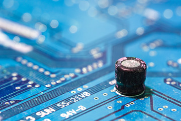 Closeup of electronic circuit board with capacitor