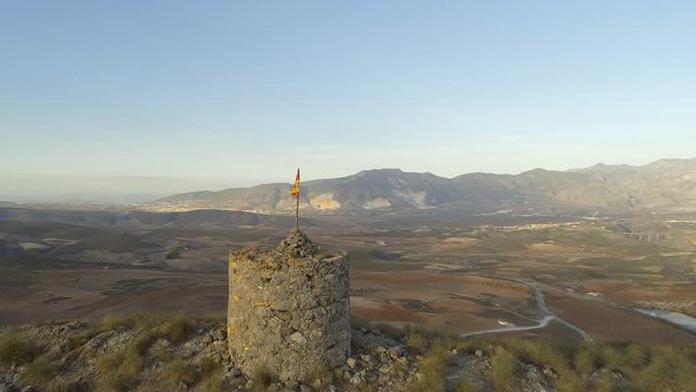 Circling an Old Abandoned Watchtower and Spanish Flag With Beautiful Landscapes