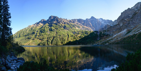 Mountain lake Morskie Oko in Tatra National Park, Poland. Picturesque lake in the mountains landscape © Roman