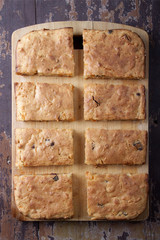 Pie of semolina with carrots and raisins on a cutting board