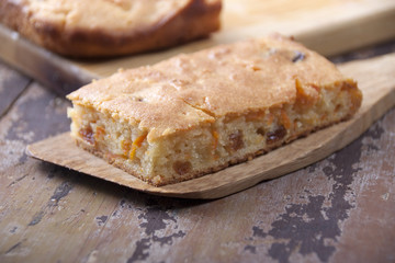 A piece of a pie of semolina with carrots