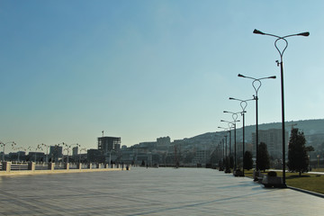 Blue city view. Panorama on the Baku Boulevard, Azerbaijan. Deserted boulevard