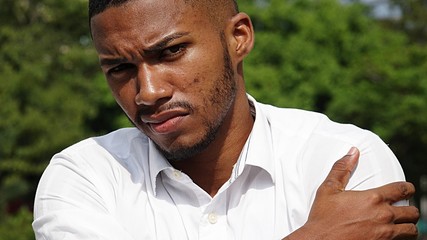 Aching Unshaven Black Person