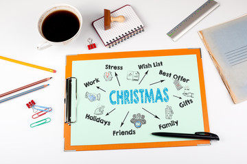 Christmas Concept. Chart with keywords and icons. Office desk with stationery.