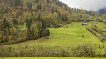 Fototapeta na wymiar Beautiful view of countryside village and mountain at autumn in Engelberg, Switzerland