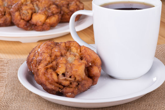 Glazed Apple Fritter and Cup of Coffee