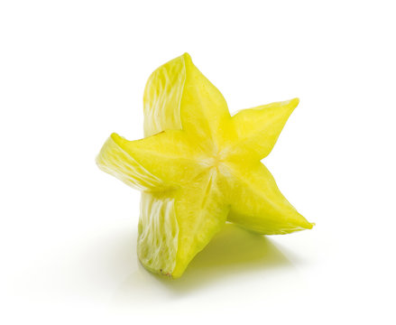 Carambola one half isolated on white background.
