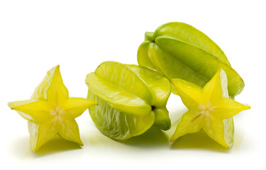Fototapeta premium Two carambola two halves isolated on white background.