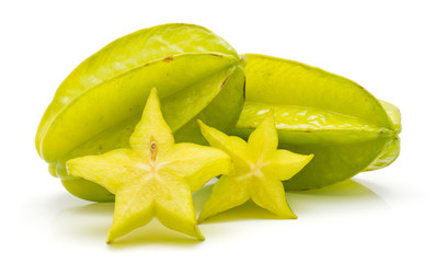 Fototapeta premium Sliced carambola isolated on white background two star slices and two whole.