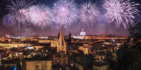 Night panorama of Rome with fireworks on the black sky , Italy