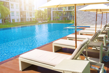 Relaxing pool bed beside swimming pool