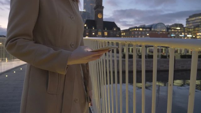 modern woman texting sms on a smartphone