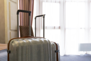 Suitcase or luggage bag in a modern hotel room