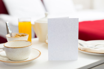 Breakfast in bed in hotel room