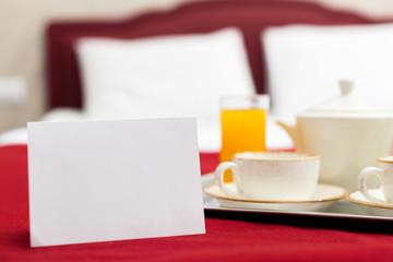 Breakfast in bed in hotel room