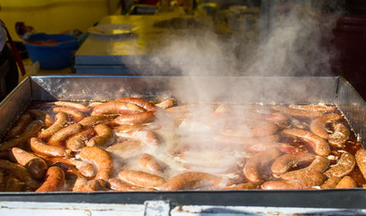 Grilling sausages at the folk festival