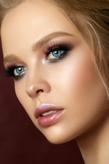 Fototapeta premium Beauty portrait of young woman with classic makeup