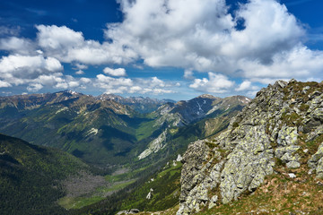 Fototapeta premium Rocky peaks and clouded sky in the Tatra Mountains in Poland.