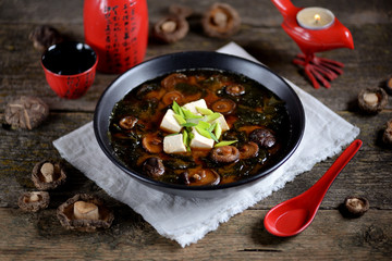 Miso soup with shiitake mushrooms, wakame seaweed, tofu cheese and dashi broth.