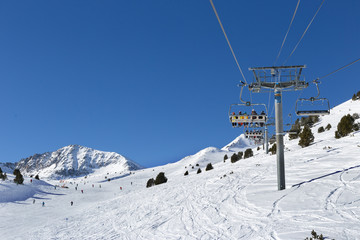 Fototapeta na wymiar Chair alpine skiing lift.