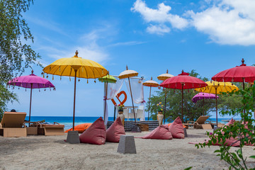 Beautiful beach with colorful umbrellas in Gili Trawangan, Indonesia © umike_foto
